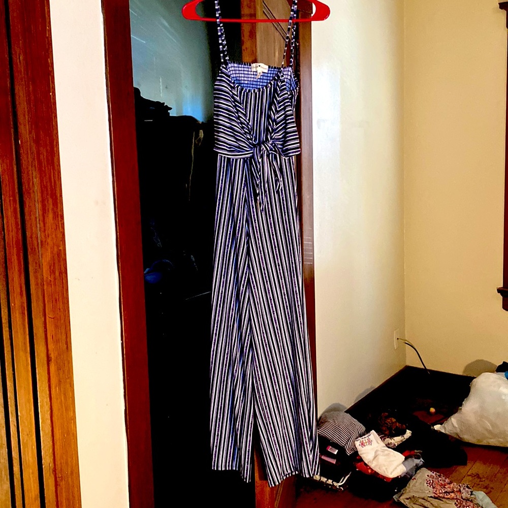Romper with thin straps.